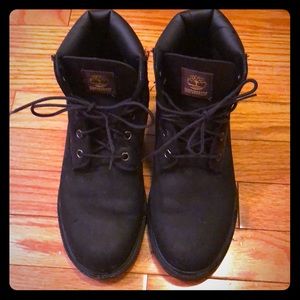 Black suede Timberland boots.